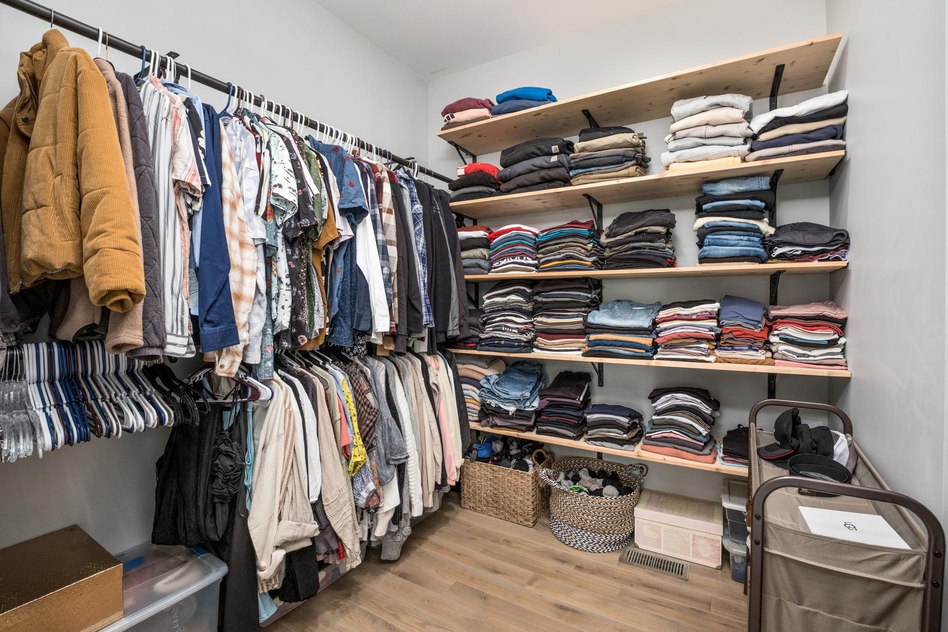 303 Bartley Street Dayton, VA 22821 - Photo 28 of 47 a view of walk in closet with clothes and shoes