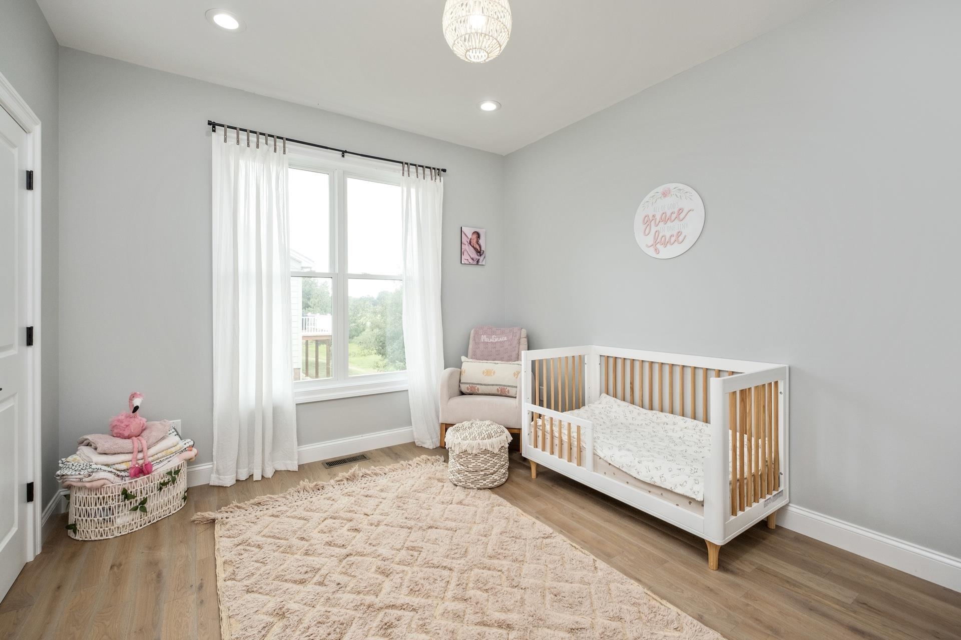 303 Bartley Street Dayton, VA 22821 - Photo 31 of 47 a bedroom with a bed and wooden floor