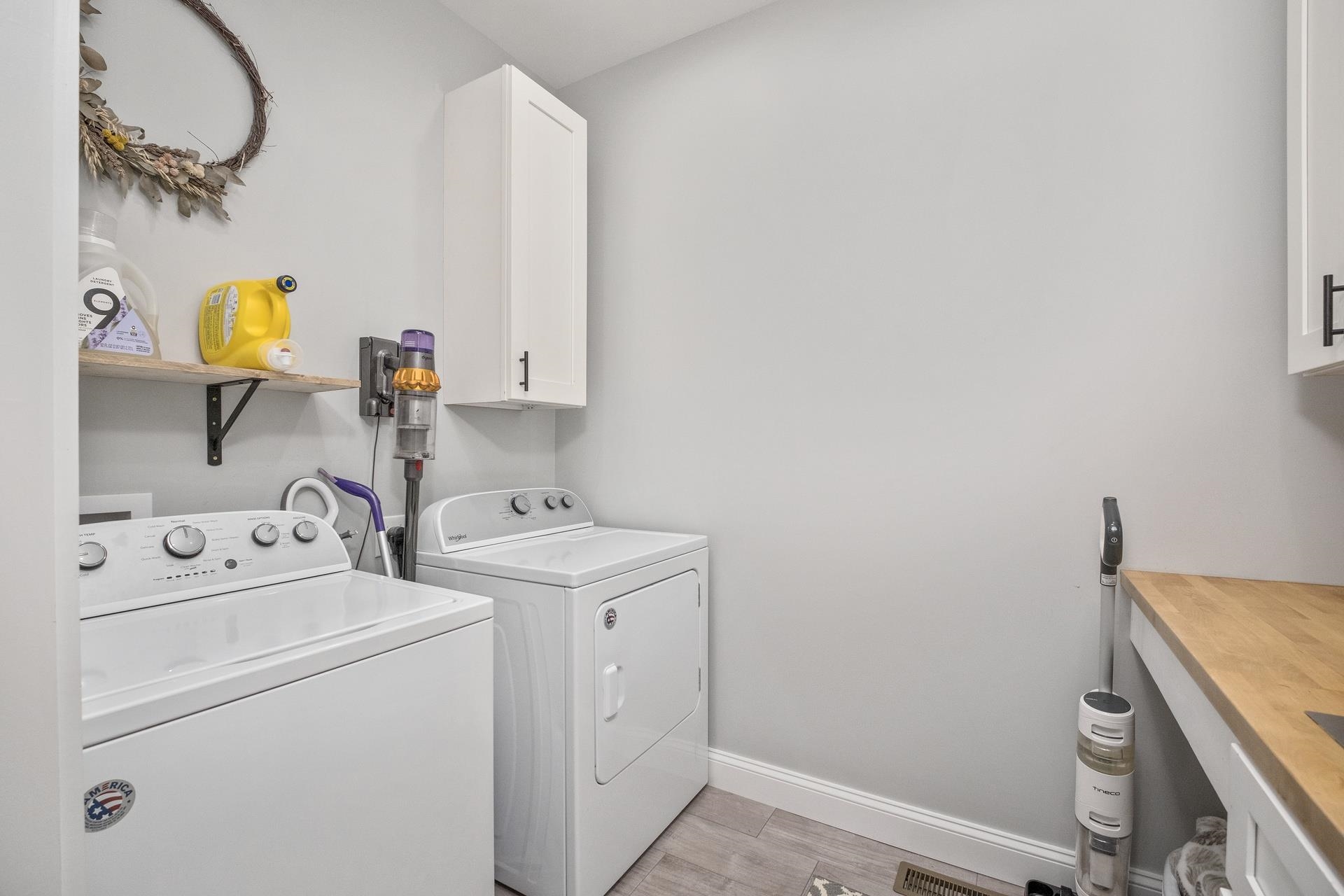303 Bartley Street Dayton, VA 22821 - Photo 32 of 47 a view of storage and utility room with washer and dryer