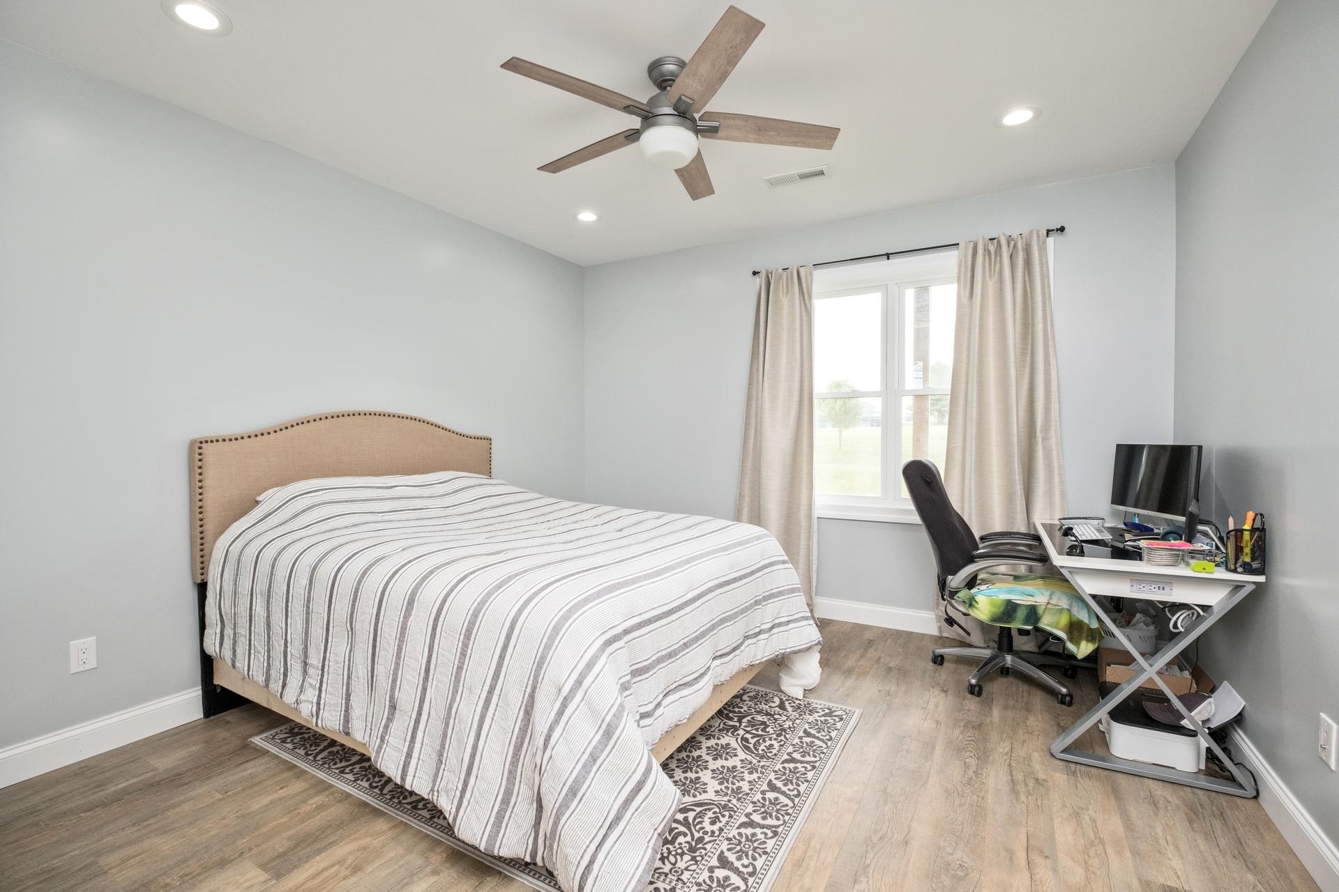 303 Bartley Street Dayton, VA 22821 - Photo 33 of 47 a bedroom with a bed and a desk