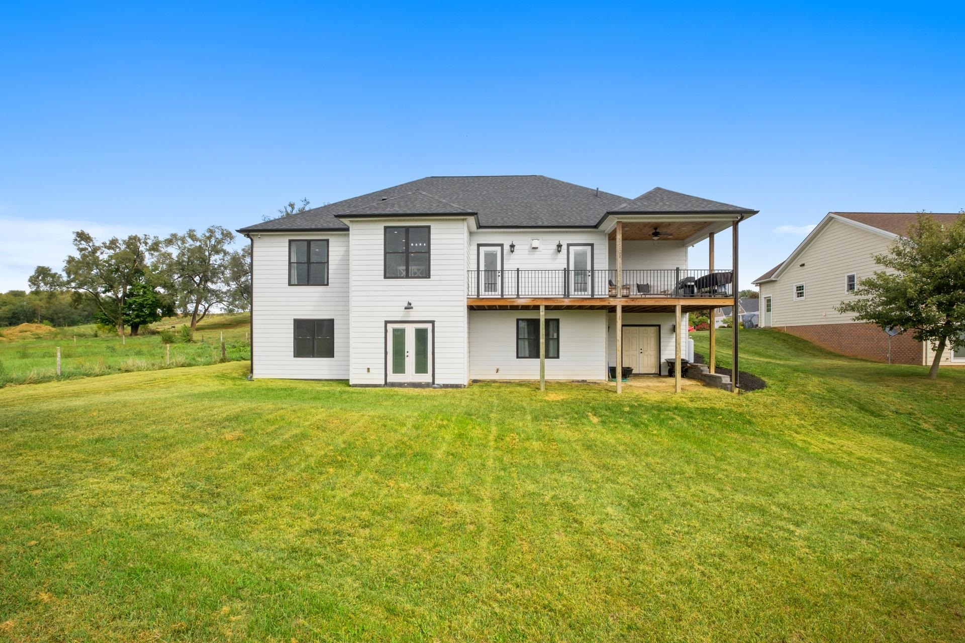 303 Bartley Street Dayton, VA 22821 - Photo 40 of 47 a view of a house with a yard patio and a garden
