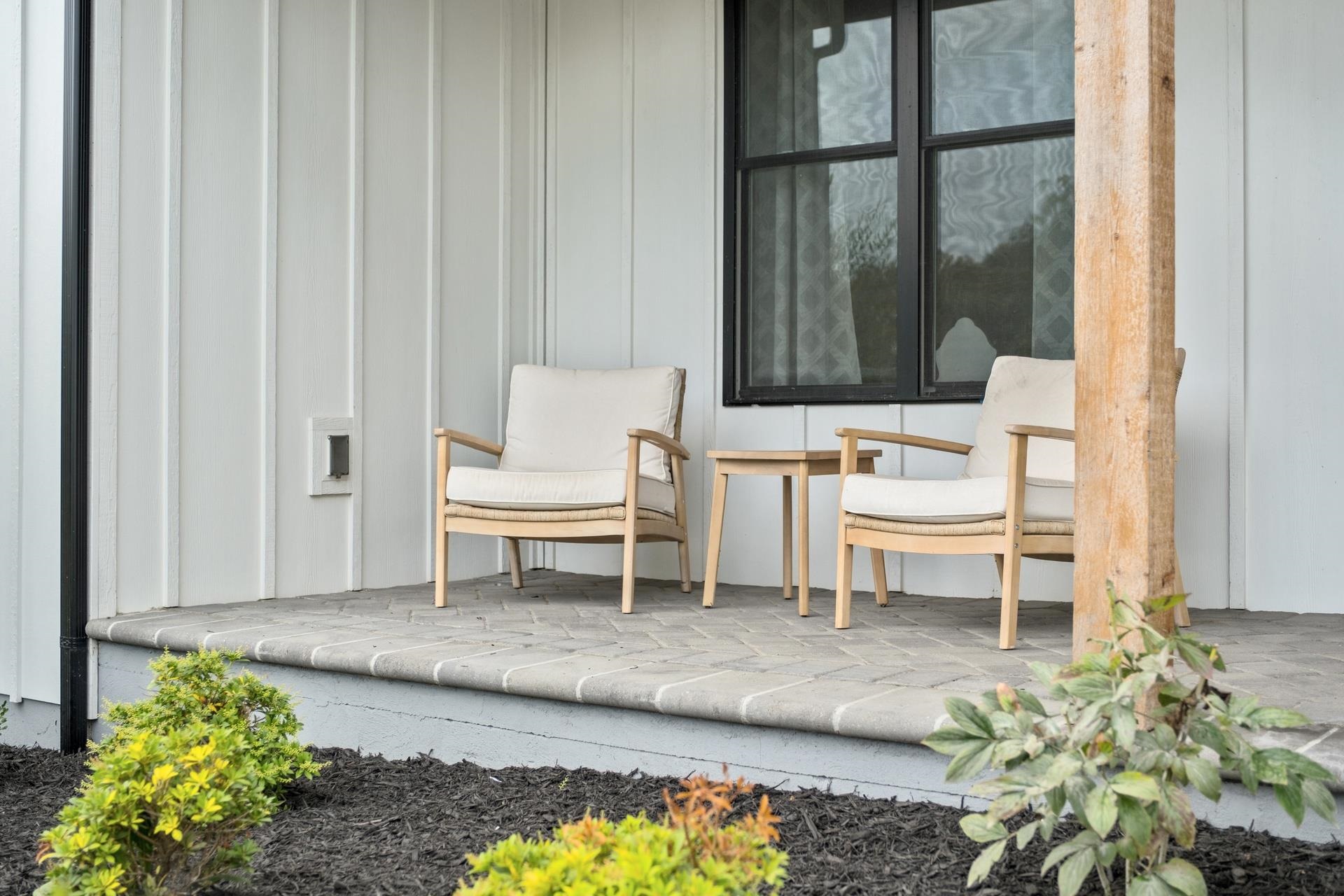 303 Bartley Street Dayton, VA 22821 - Photo 4 of 47 a living room with a rug table and chairs