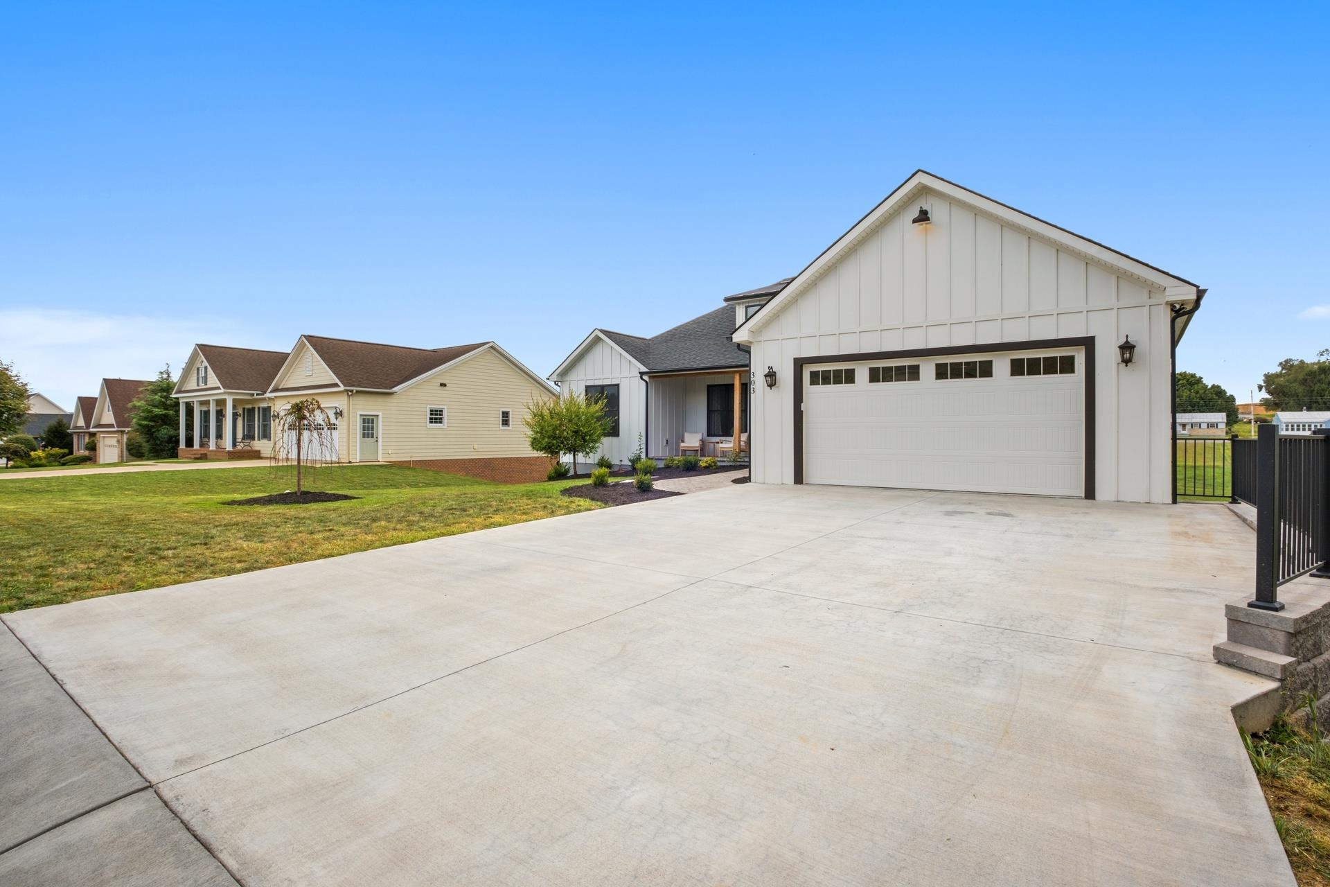 303 Bartley Street Dayton, VA 22821 - Photo 46 of 47 a view of a house with a yard and garage