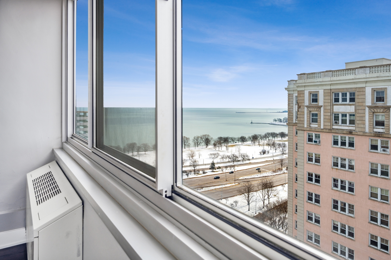 5601 North Sheridan Road, Unit 21E Chicago, IL 60660 - Photo 16 of 27 a view of a building from a balcony