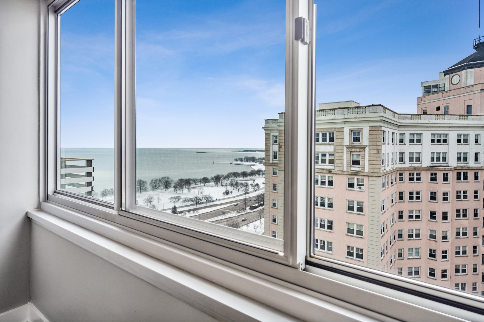 5601 North Sheridan Road, Unit 21E Chicago, IL 60660 - Photo 18 of 27 a view of a building from a window