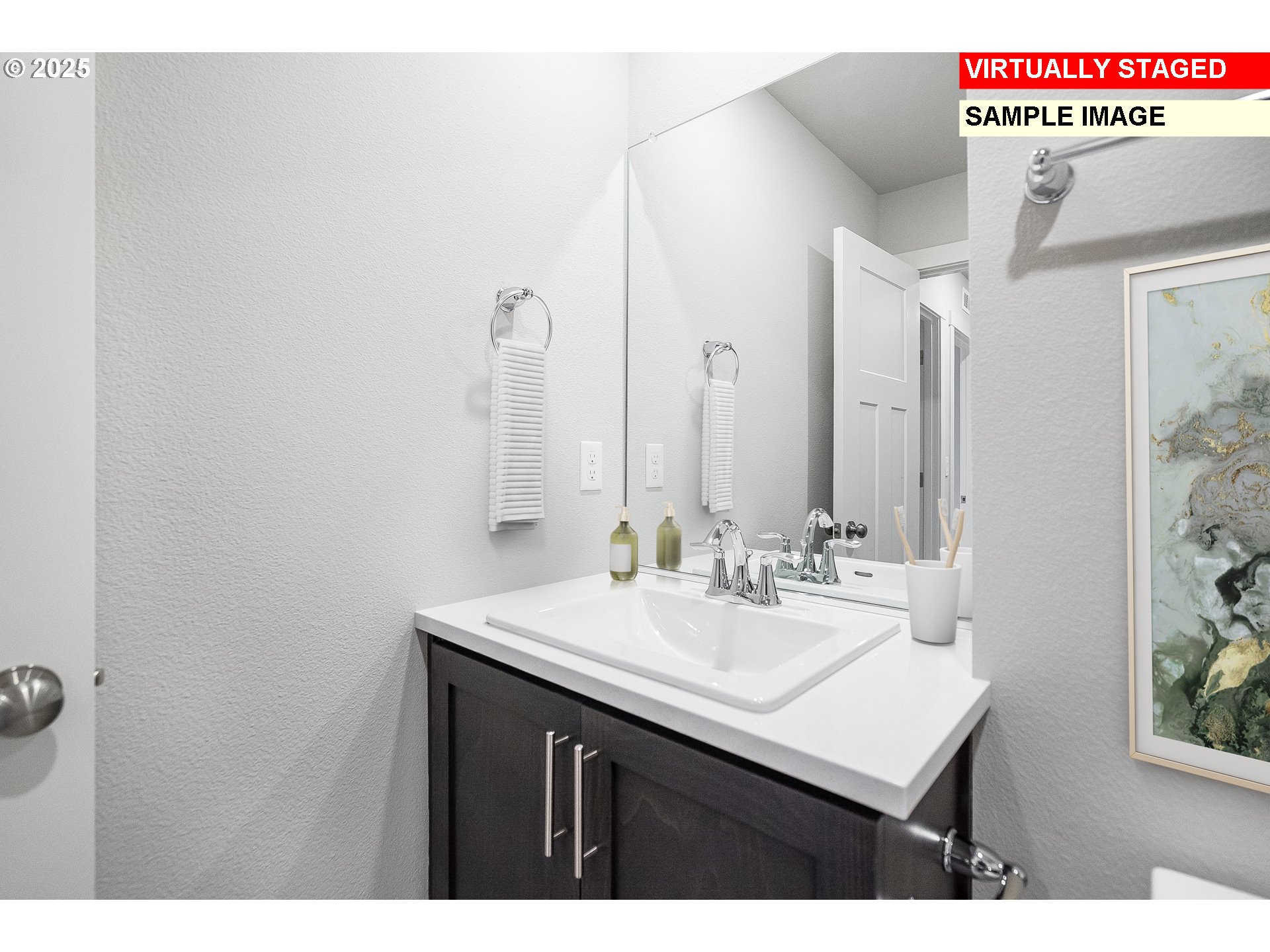 4083 Southwest McKinley Street Gresham, OR 97080 - Photo 7 of 25 a bathroom with a sink vanity and a mirror