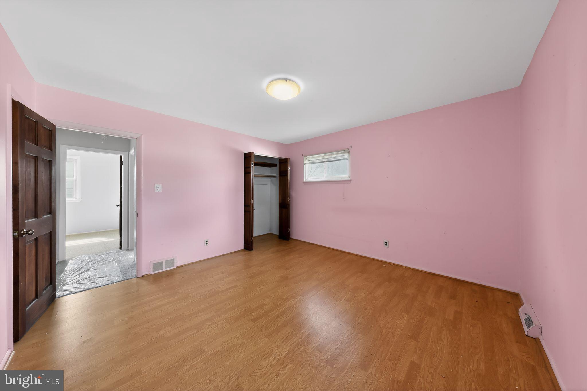 214 Bluefield Road Newark, DE 19713 - Photo 12 of 28 a view of an empty room with wooden floor