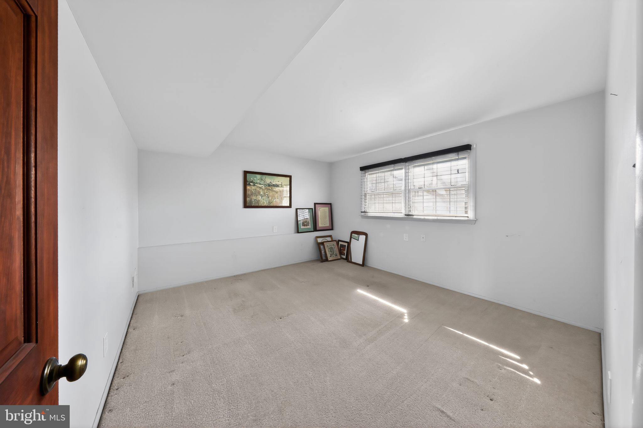 214 Bluefield Road Newark, DE 19713 - Photo 22 of 28 an empty room with windows
