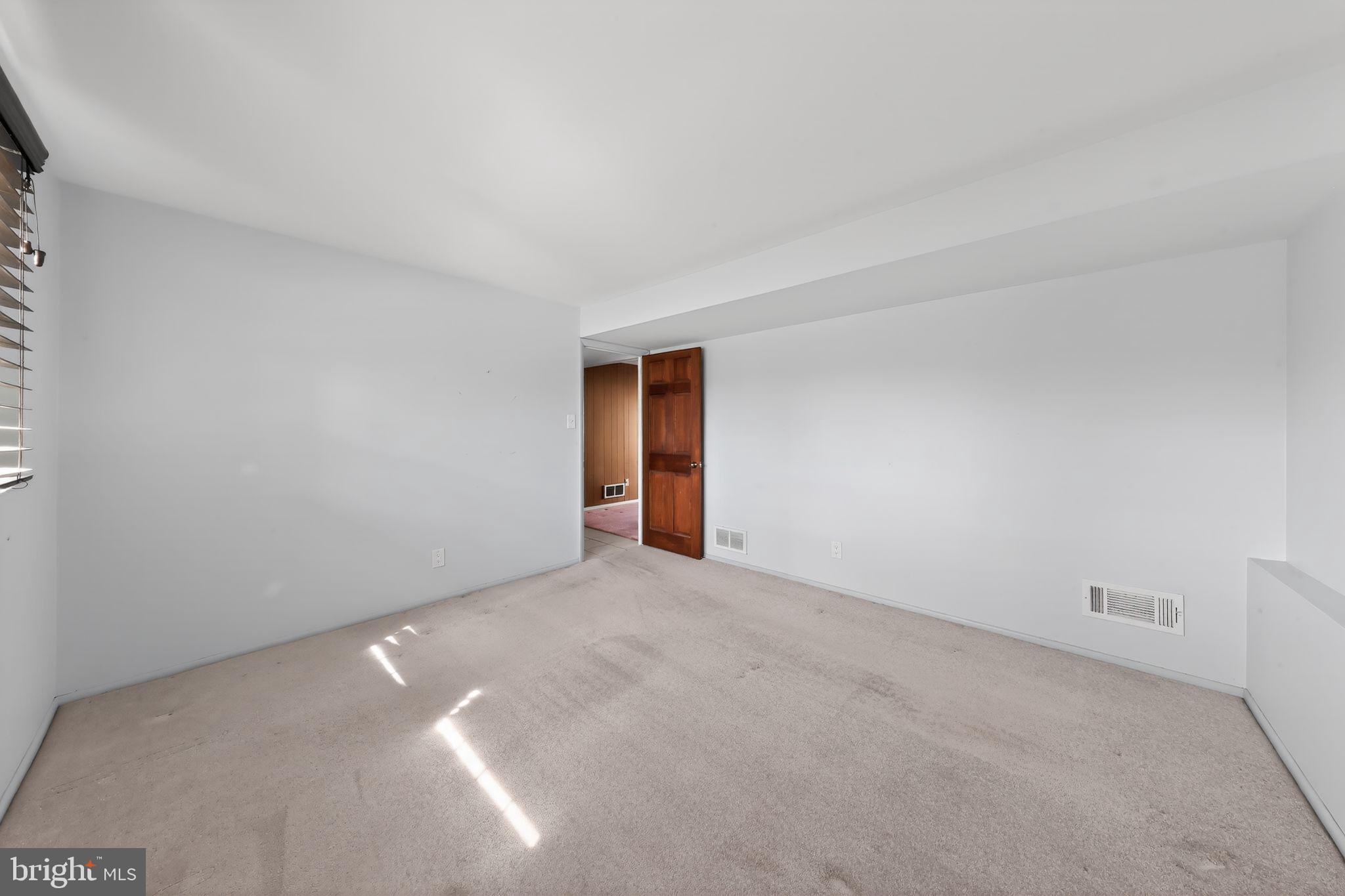 214 Bluefield Road Newark, DE 19713 - Photo 23 of 28 a view of an empty room and a window