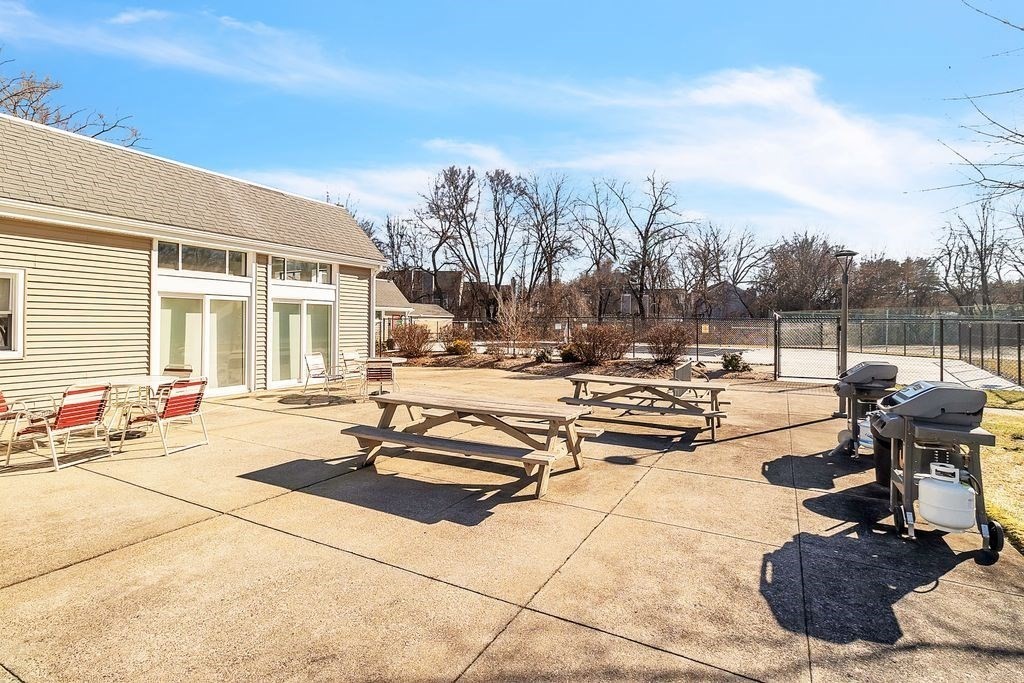 103 Nassau Drive, Unit 103 Springfield, MA 01129 - Photo 23 of 25 a view of a terrace with chairs