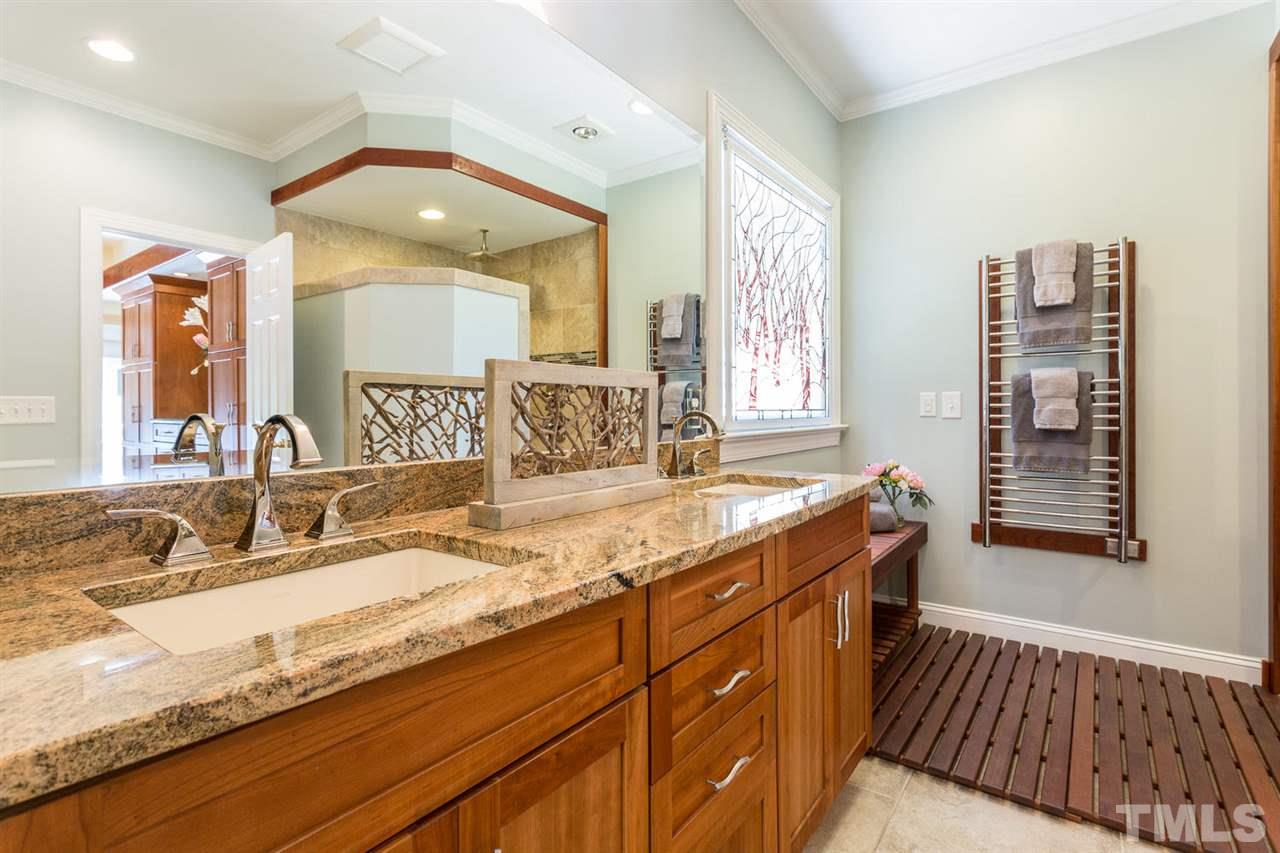 2537 Mt Vernon Church Road Raleigh, NC 27614 - Photo 18 of 30 a bathroom with a granite countertop sink mirror and