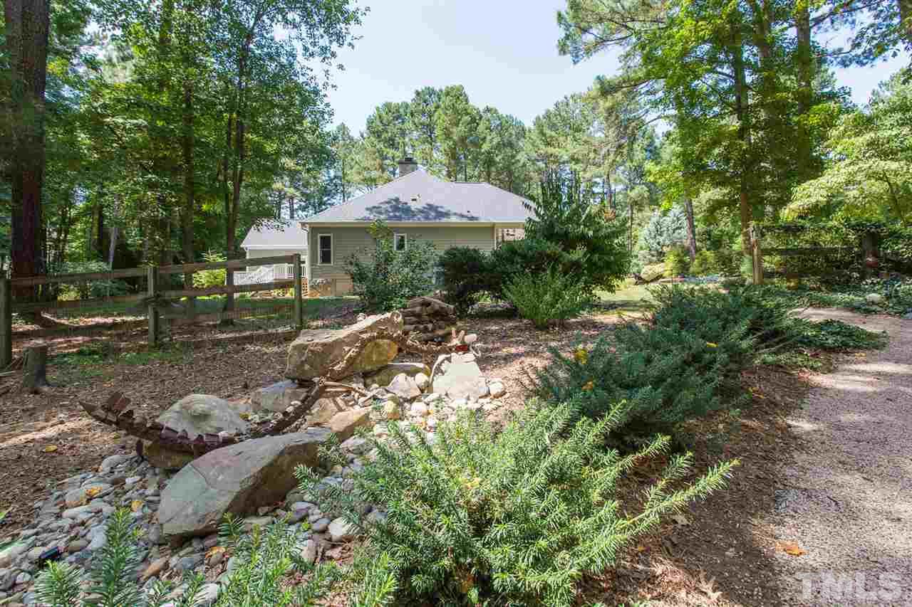 2537 Mt Vernon Church Road Raleigh, NC 27614 - Photo 29 of 30 a backyard of a house with table and chairs