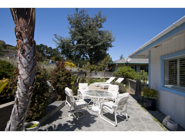 2995 Ribera Road Carmel, CA 93923 - Photo 12 of 16 a view of a chairs and table in a patio