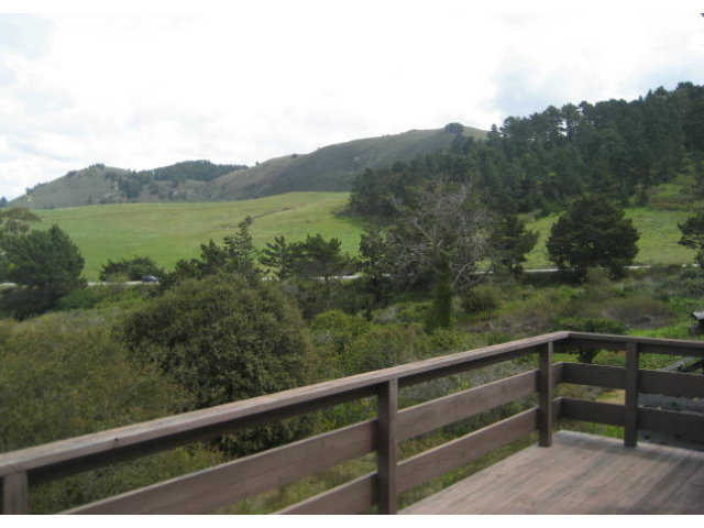 2995 Ribera Road Carmel, CA 93923 - Photo 2 of 16 a view of a lake from a balcony