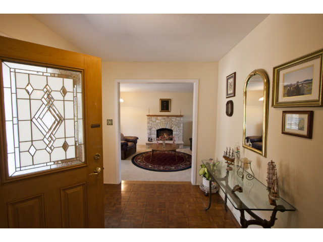 2995 Ribera Road Carmel, CA 93923 - Photo 4 of 16 a living room with furniture and a fireplace