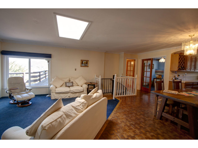 2995 Ribera Road Carmel, CA 93923 - Photo 7 of 16 a living room with furniture and a large window