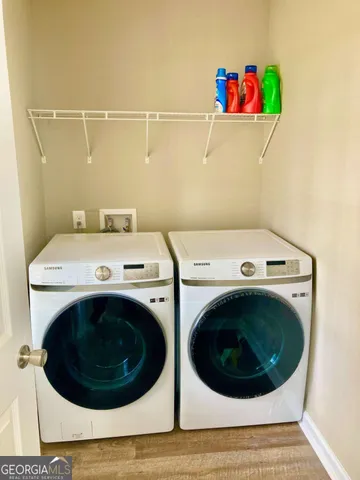 a utility room with dryer and washer