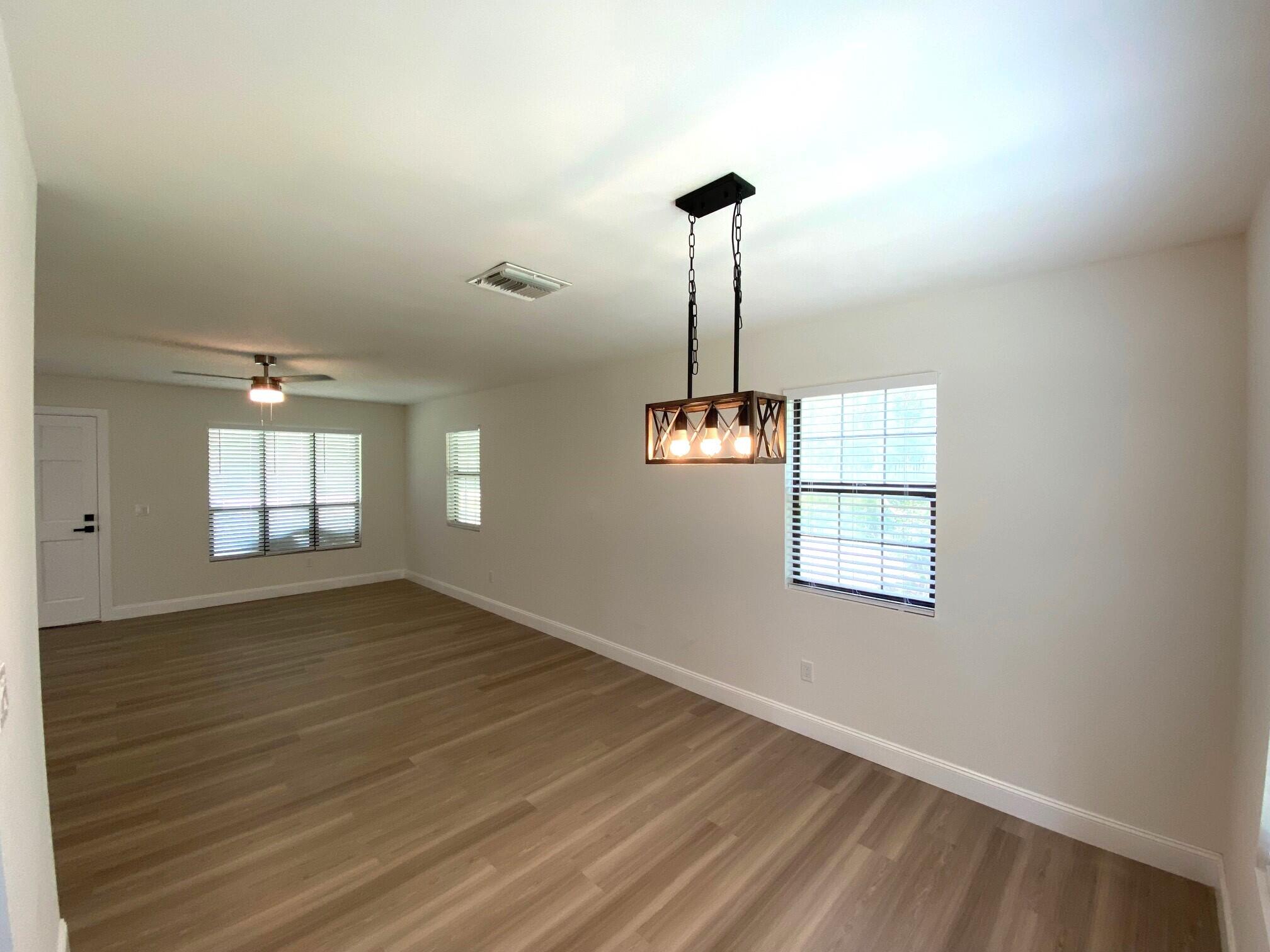 17389 63rd Road North Loxahatchee, FL 33470 - Photo 8 of 25 Dining room and living room