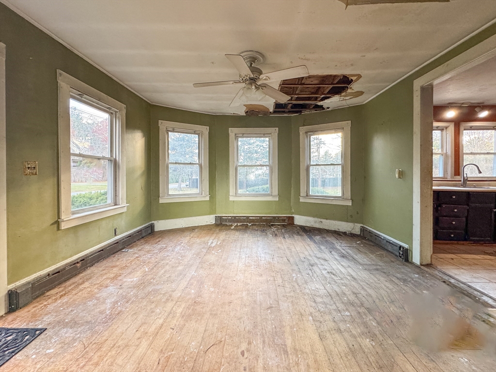 53 Miller Street Middleboro, MA 02346 - Photo 12 of 26 wooden floor in an empty room with a window