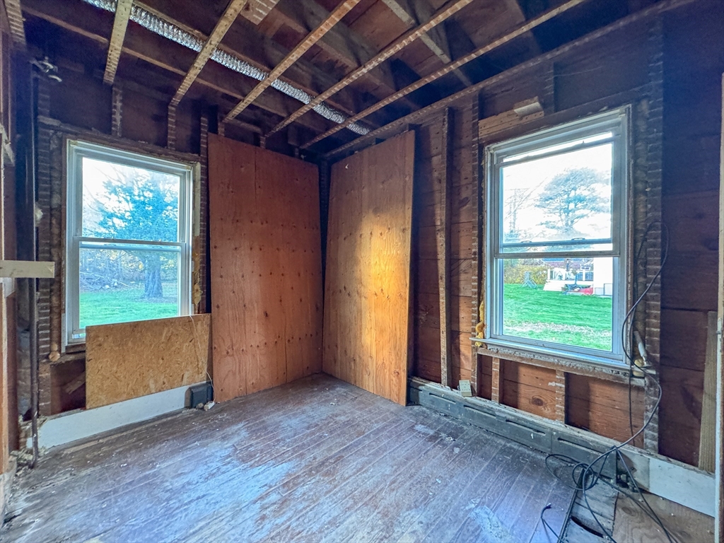53 Miller Street Middleboro, MA 02346 - Photo 16 of 26 a view of empty room with wooden floor and fan