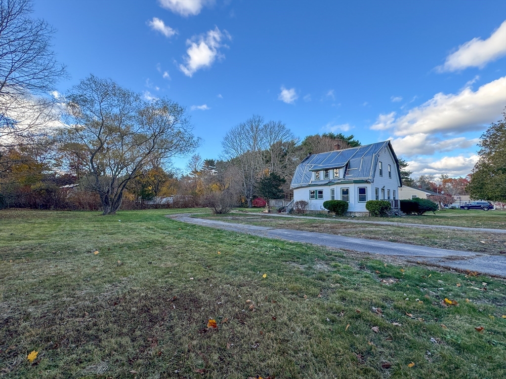 53 Miller Street Middleboro, MA 02346 - Photo 21 of 26 a view of a house with a yard