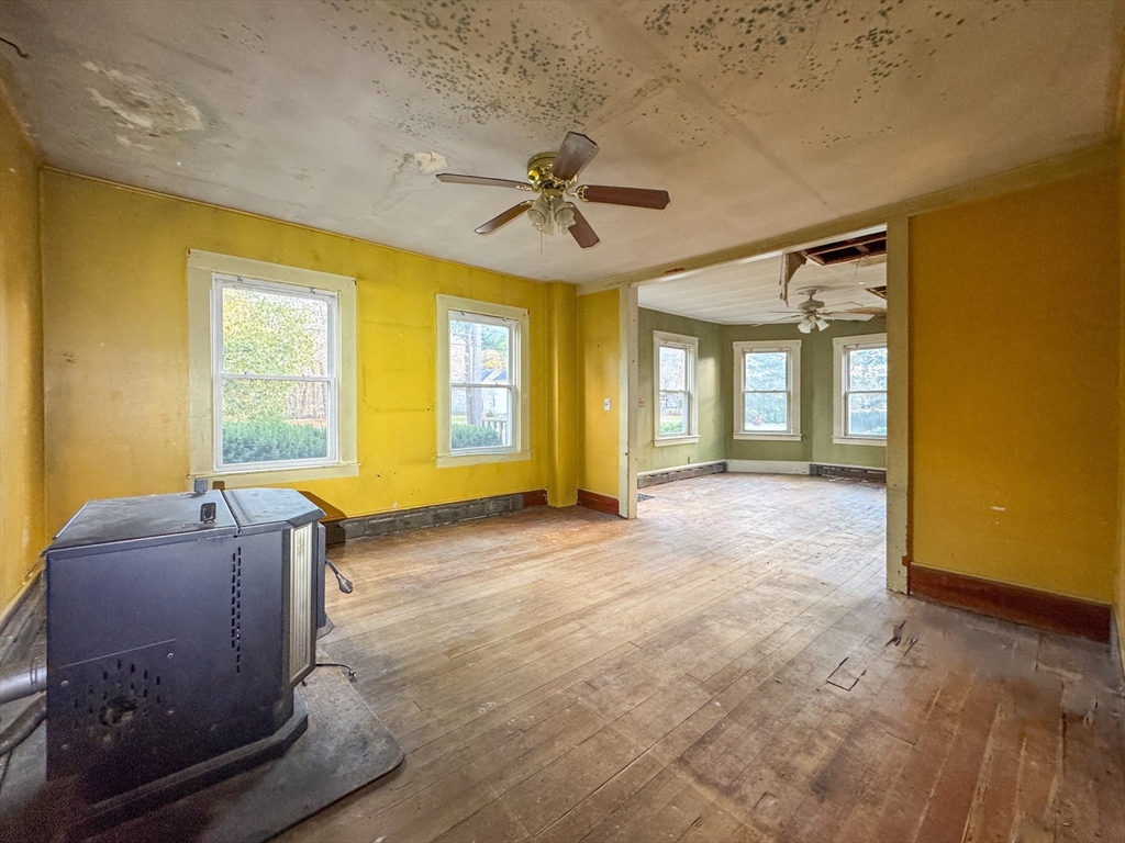 53 Miller Street Middleboro, MA 02346 - Photo 9 of 26 a spacious bedroom with a bed and glass windows
