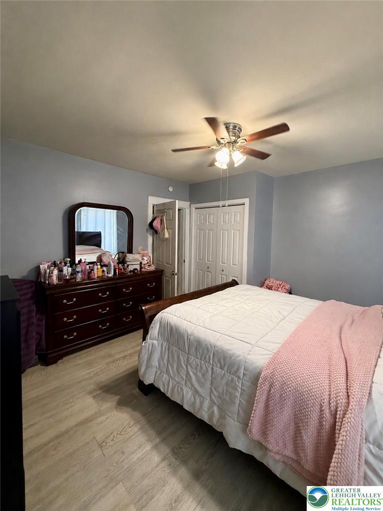 1025 Spring Street Bethlehem, PA 18018 - Photo 11 of 20 Comfortable bedroom featuring practical flooring and a functional ceiling fan for optimal airflow.