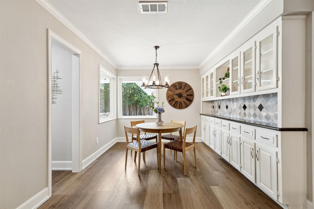 14420 Overview Drive Dallas, TX 75254 - Photo 12 of 35 a view of a dining room with furniture window and wooden floor