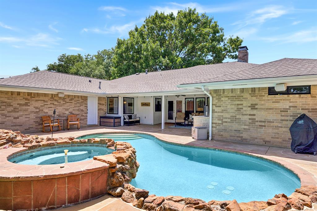 14420 Overview Drive Dallas, TX 75254 - Photo 34 of 35 a view of a house with swimming pool and sitting area