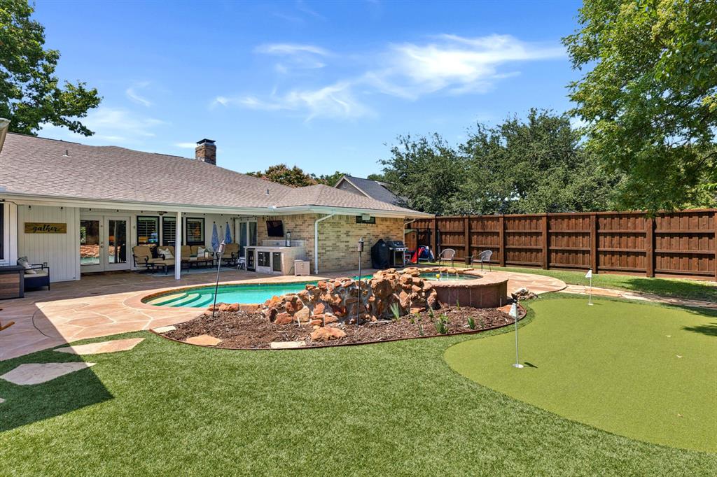 14420 Overview Drive Dallas, TX 75254 - Photo 35 of 35 a view of a house with swimming pool and sitting area
