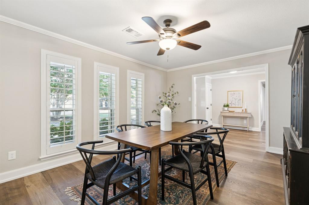 14420 Overview Drive Dallas, TX 75254 - Photo 6 of 35 a view of a dining room with furniture window and wooden floor
