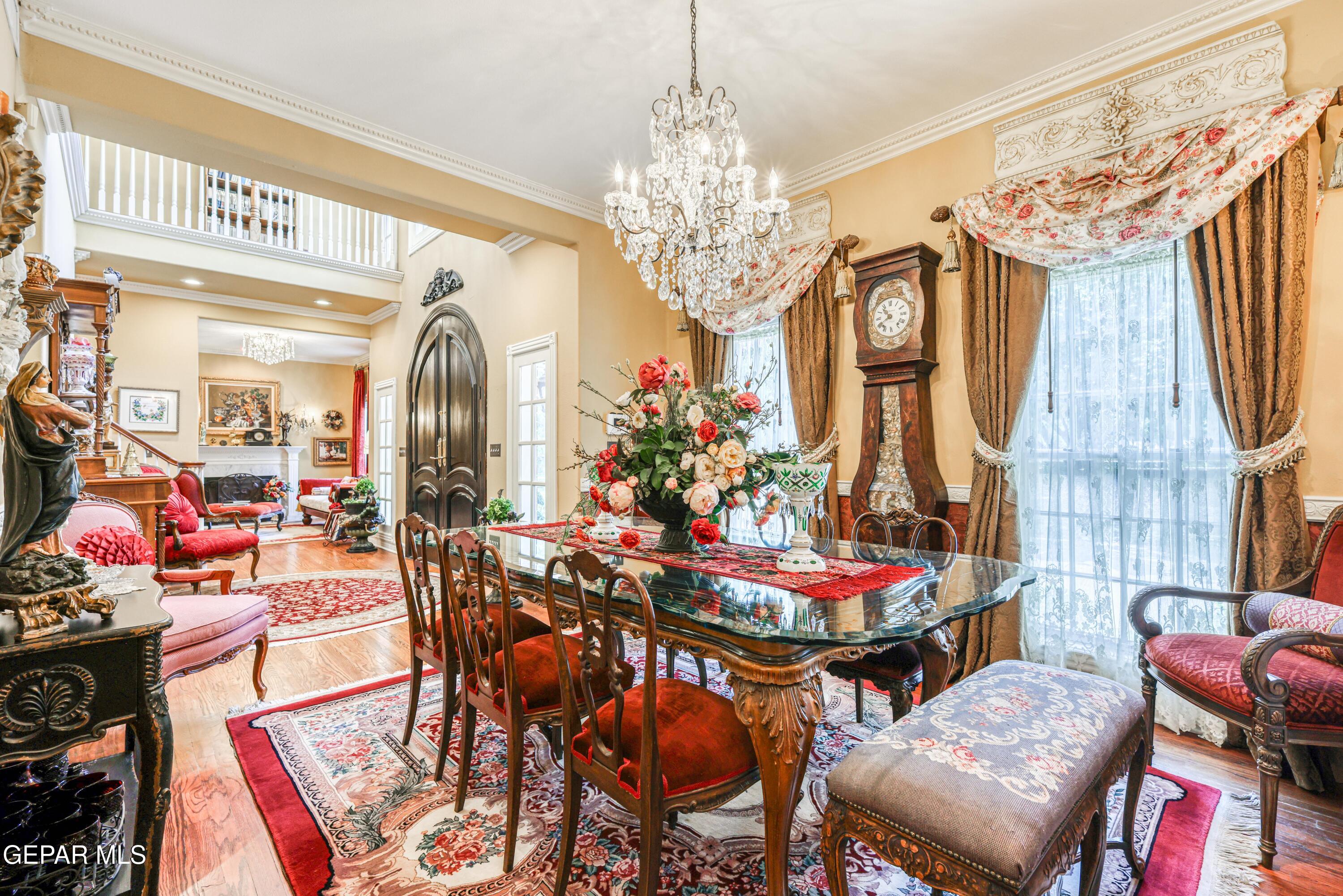 501 Country Club Road El Paso, TX 79932 - Photo 20 of 88 a view of a dining room with furniture and chandelier
