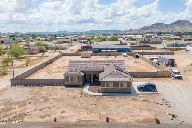 a view of a street with a building in the background