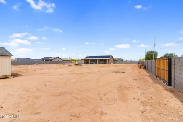 an aerial view of residential building and parking space