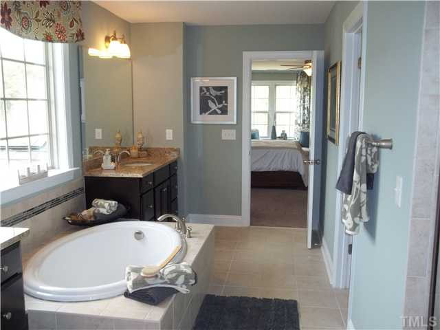 2201 Lower Lake Road Wake Forest, NC 27587 - Photo 15 of 25 Deluxe Master Bath included with large Walk In Shower & all this TILE on the floor and tile Shower Surround is Included! Master Bath/Spa