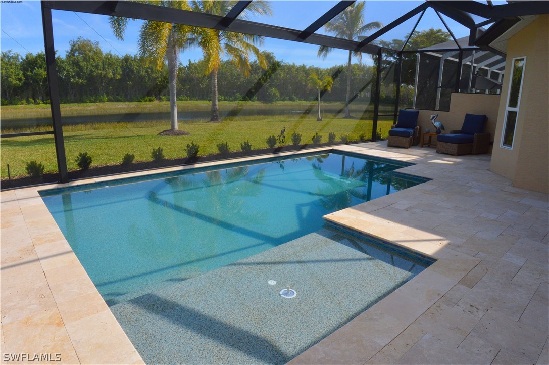 a view of a swimming pool with a porch