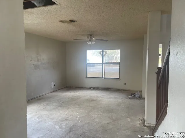 a view of a entryway door with hallway