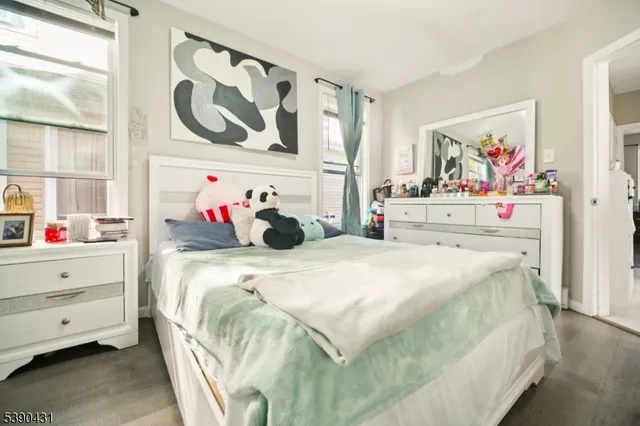 a bedroom with a bed and closet