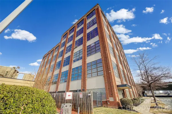 a view of a multi story residential apartment building