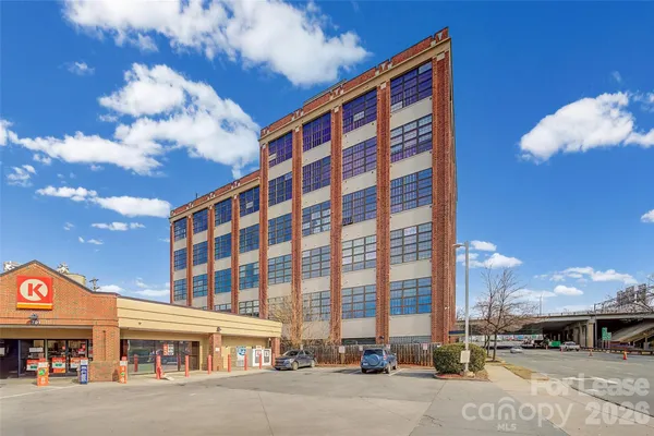 a view of a building with a street