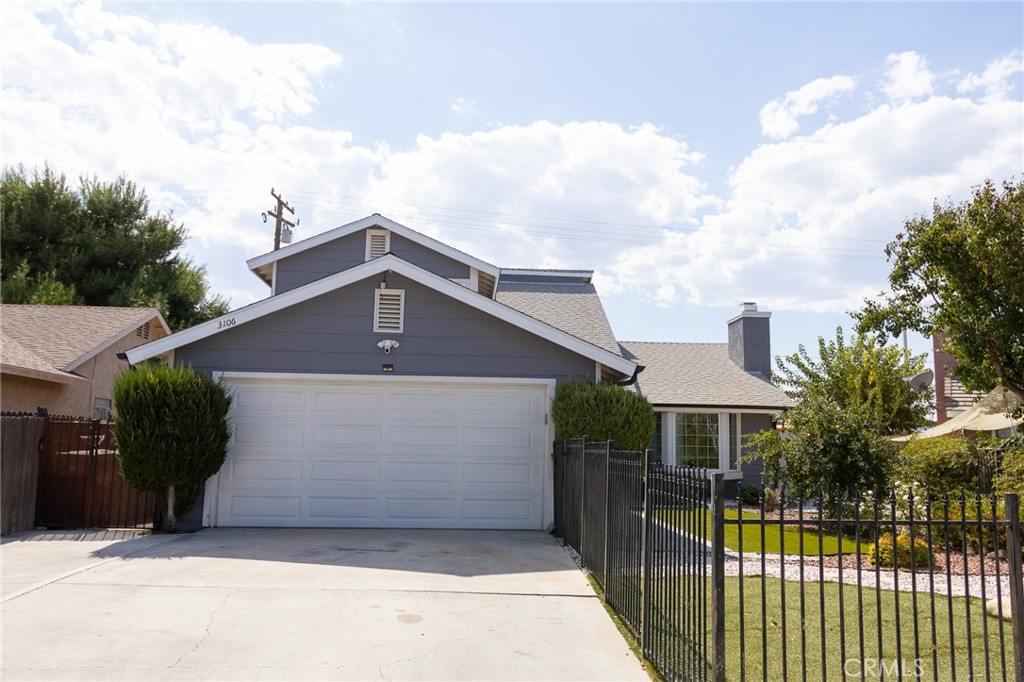 3106 East Ave R7 Palmdale, CA 93550 - Photo 1 of 1 a front view of a house with a yard