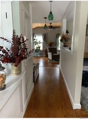 a view of living room and kitchen