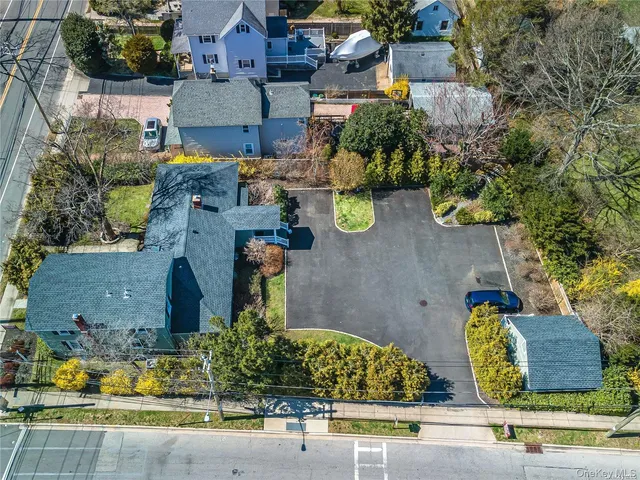 an aerial view of a house with swimming pool