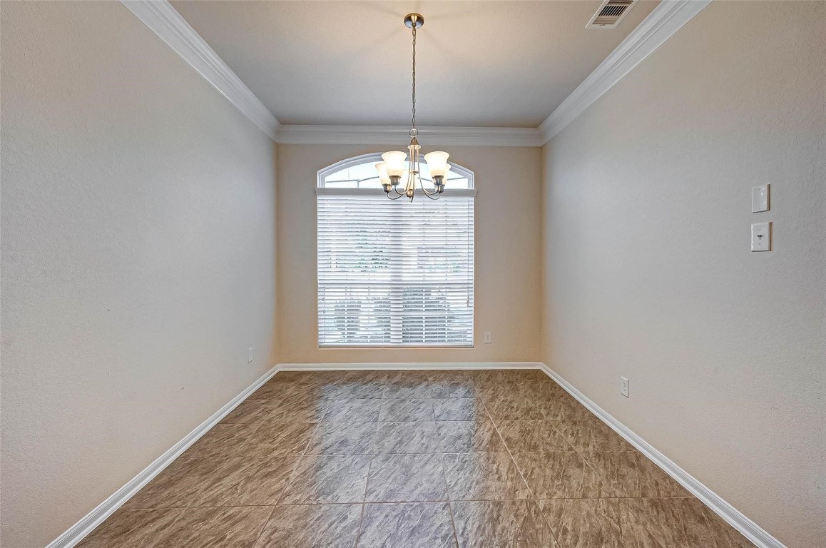 3322 Coopers Ridge Way Houston, TX 77084 - Photo 12 of 41 Comfortable dining space conveniently located near the kitchen and living room.
