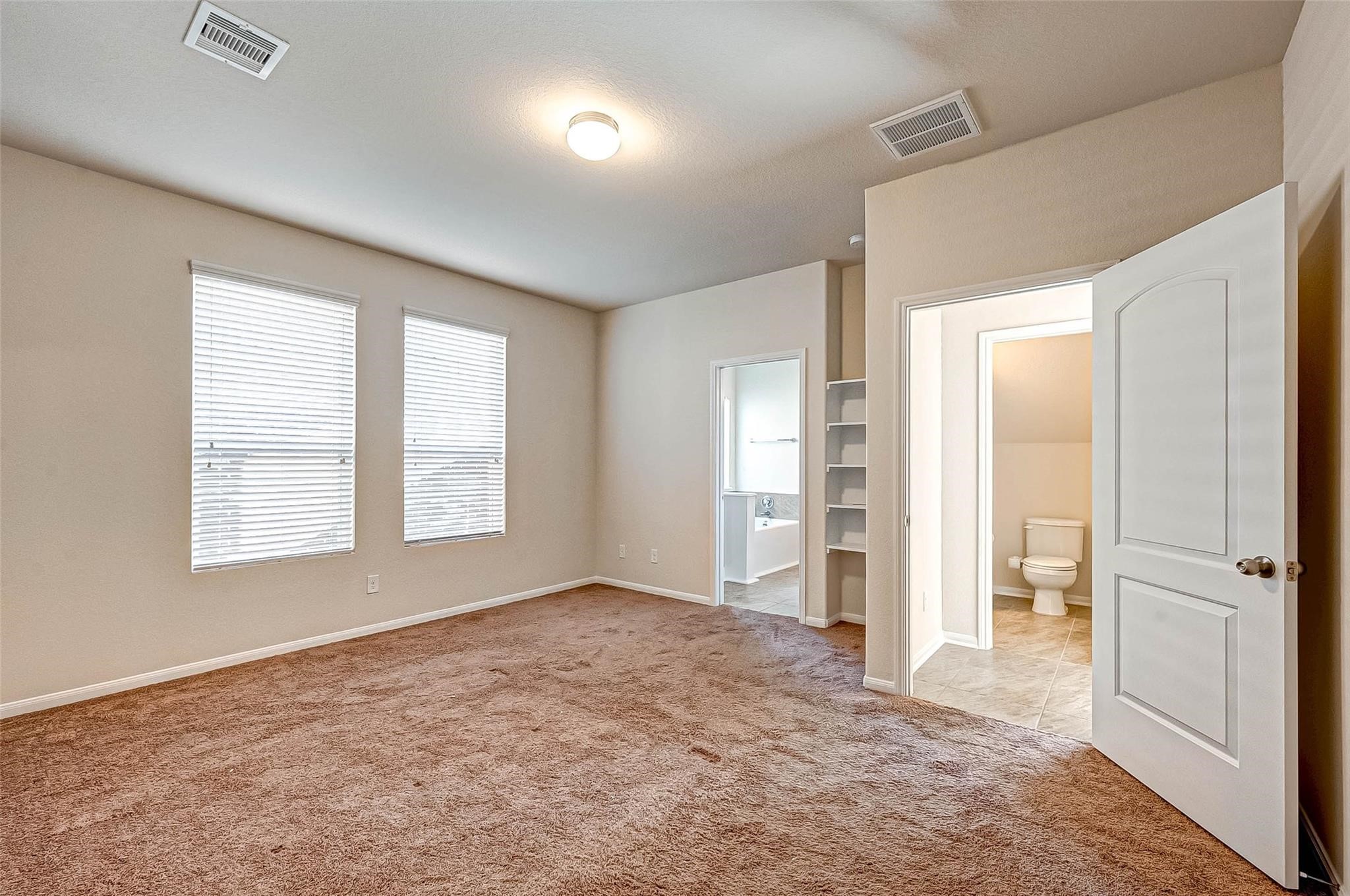 3322 Coopers Ridge Way Houston, TX 77084 - Photo 16 of 41 Primary features easy access to en-suite bathroom.