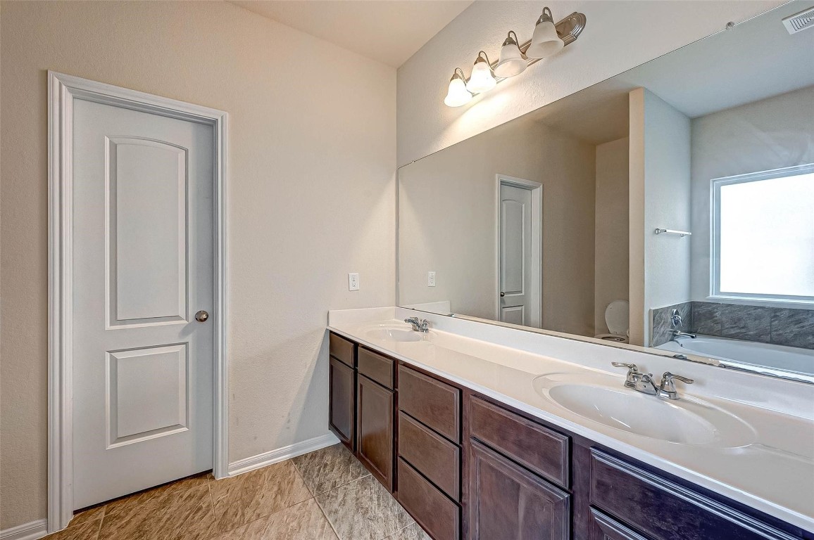 3322 Coopers Ridge Way Houston, TX 77084 - Photo 20 of 41 Primary bath offers abundant counter space.
