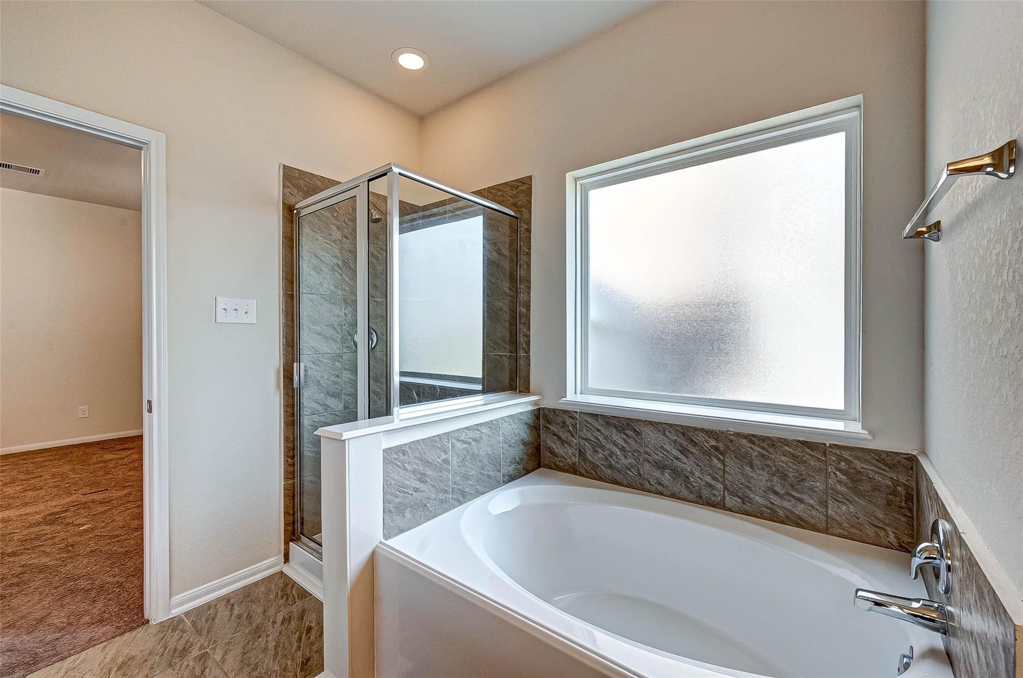 3322 Coopers Ridge Way Houston, TX 77084 - Photo 21 of 41 Primary bath soaking tub and seperate shower.