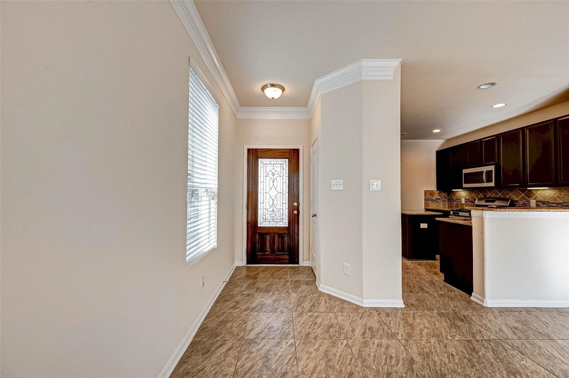 3322 Coopers Ridge Way Houston, TX 77084 - Photo 3 of 41 Welcoming entry with natural light, creating an inviting first impression.