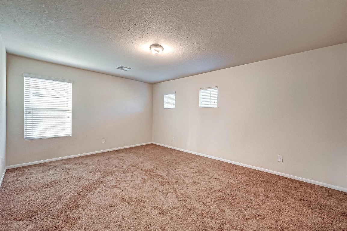 3322 Coopers Ridge Way Houston, TX 77084 - Photo 33 of 41 Additional bedroom ideal for guests, office, or flex use.