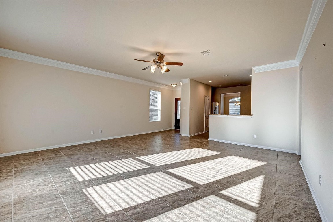 3322 Coopers Ridge Way Houston, TX 77084 - Photo 5 of 41 Stunning open-concept living room with abundant natural light and seamless flow.